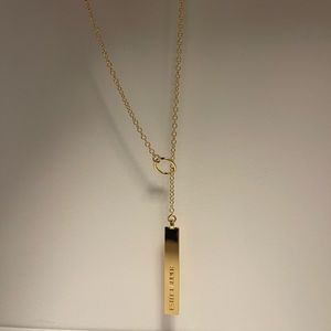 NWOT Esteè Lauder gold necklace